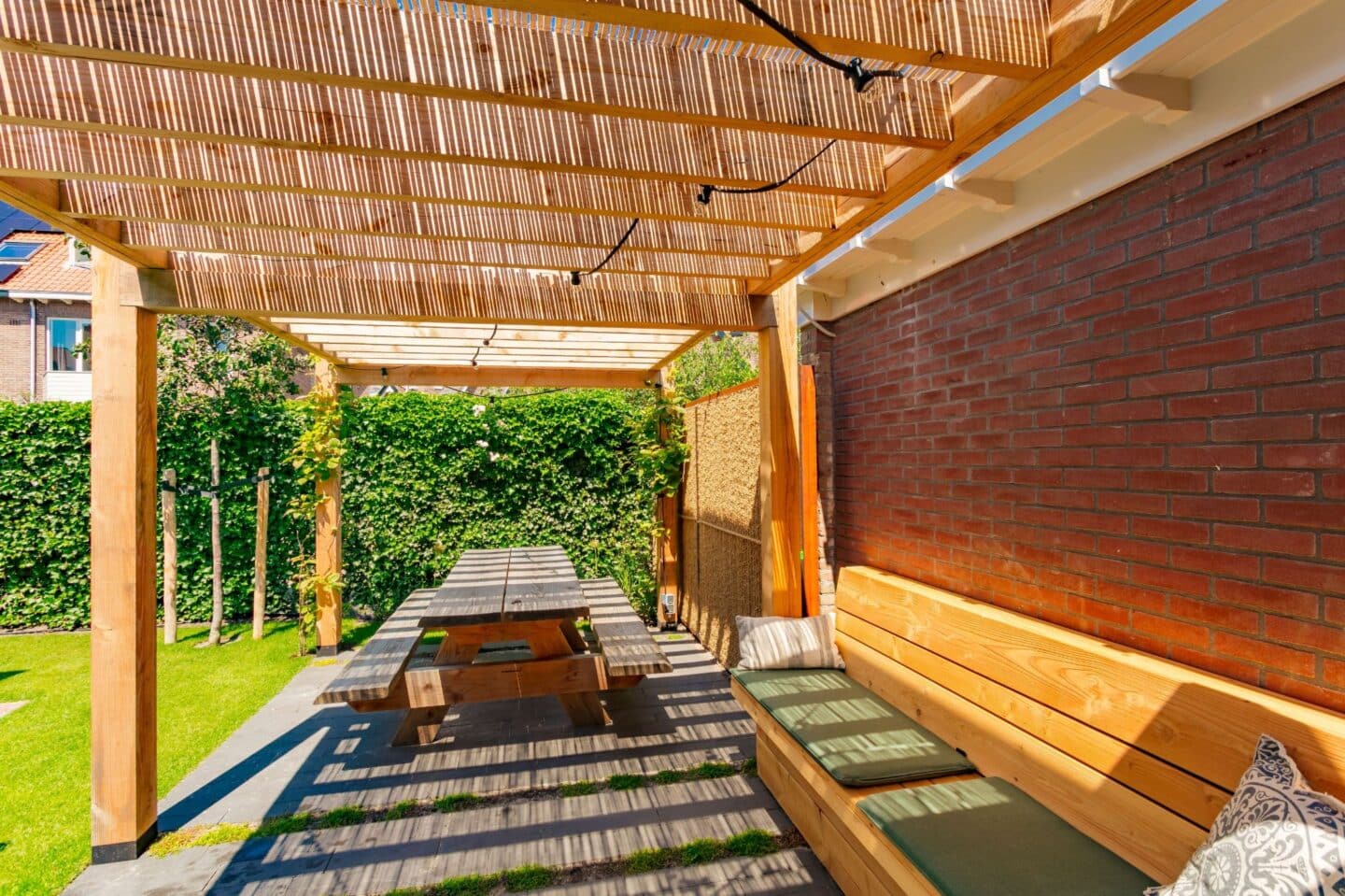 Ontwerp en aanleg pergola met zithoek