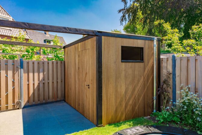 Aanleg pergola en terras nieuwbouwtuin